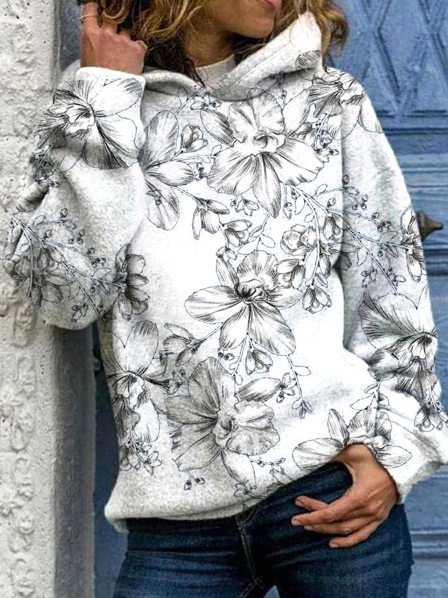 Sudadera con capucha casual de patrón floral de las mujeres